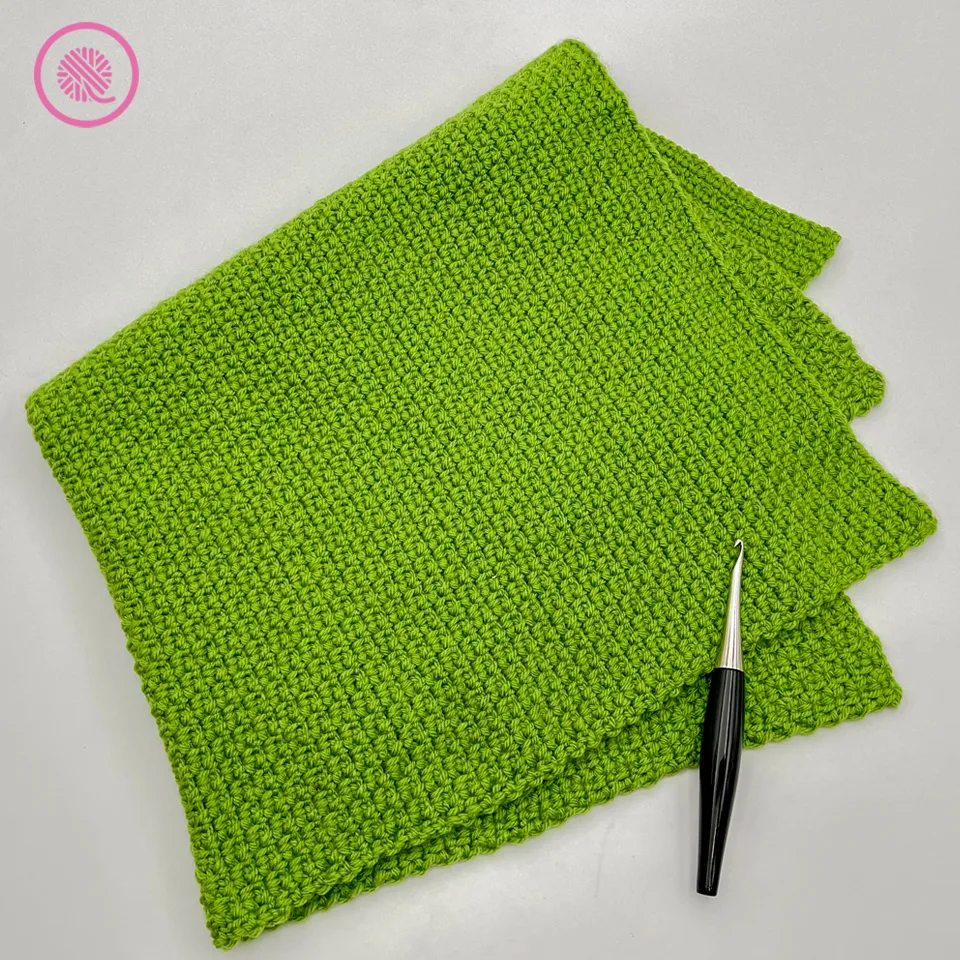 Linen Blanket
By Kristen Mangus
Cozy up with the cuddly Linen Blanket! The linen stitch creates a textured, dense fabric that is perfect for blankets of all sizes. From a small baby lovey to a large throw blanket you can use this pattern to crochet them all.
Pattern includes written instructions for 4 blanket sizes and links to fully captioned tutorial videos for both left and right handed crocheters.
MATERIALS
(Materials list may contain affiliate links to products I used to make this project. Using these links cost you nothing, but helps support GKK.)
Yarn
Medium (#4) weight yarn
Caron One Pound (454 g/16 oz, 742 m/812 yds.) in color Lavender Blue and Premier Anti-Pilling Everyday Worsted (3.5 oz/100 g, 180 yds/165m) in color Green Apple used in samples.
Hook
US Size H-8 (5 mm) hook
Furls Odyssey (5 mm size H) in Black & Nickel used in sample.
Tapestry needle
ABBREVIATIONS
ch = chain
ch-1 space = chain 1 space
ch-2 space = chain 2 space
rep = repeat
sc = single crochet
sk = skip
st(s) = stitch(es)
GAUGE
17 sts x 16.5 rows in 4” (10 cm) in linen stitch
SKILL LEVEL Easy
MEASUREMENTS
Lovey: 12” x 12” (30.5 cm x 30.5 cm)
Car Seat: 24" x 30" (60 x 75 cm)
Stroller: 30" x 35" (75 x 87.5 cm)
Crib: 45" x 60" (112.5 x 150 cm)
Throw: 60" x 70" (150 x 175 cm)
NOTES
The linen stitch pattern is a multiple of 2+1 with a 1 row repeat.
TUTORIAL VIDEOS
The following tutorial videos demonstrate how to make the linen stitch pattern.
Right handed: https://youtu.be/taOXnH5HMNI
Left handed: https://youtu.be/dGo1pOiHbh8
INSTRUCTIONS
Chain 51 (103, 129, 193, 255).
Foundation Row: Sc into 3rd chain from the hook, *ch 1, skip 1, sc in next chain, rep from * to end of row.
Row 1: Turn, ch2, *sc into ch-1 space, ch 1, repeat from * to last stitch, sc in ch-2 space.
Repeat Row 1 until piece measures 12” (35”, 60”, 70”) or until desired length. Cut yarn, pull loop through and weave in ends.