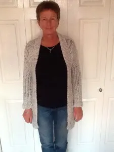 Longer length body & sleeves with cuff. Using 1 strand of Aran. Collared Cardigan